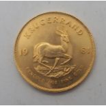 A South African one krugerrand, 33.9 grams Condition Report: Available upon request