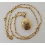 A 9ct gold double sided locket 3.3cm x 1.9cm, together with a 9ct chain 650cm, weight 20gms
