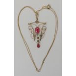 An Edwardian pink glass gem and pearl pendant, length 5cm, on a 9ct box chain length 50cm, weight