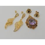 A 9ct gold amethyst pendant (needs bail) a pair of 9ct filigree earrings and a pair set with
