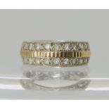 A 9ct white gold wide wedding ring with a double row of clear gems, size K, weight 4.6gms