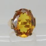 A 9ct gold glass cairngorm style ring hallmarked Birmingham 1965, size L, weight 5.5gms Condition