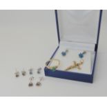 A 9ct gold emerald and white sapphire ring size N, three pairs of 9ct gem set earrings including