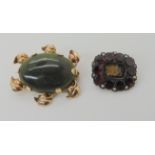 A yellow metal green hardstone brooch and a (af) garnet and pearl brooch weight combined 10.6gms