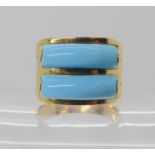 An Italian 18k gold turquoise ring size O1/2, weight 4.9gms Condition Report: Available upon