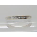 A 9ct white gold baguette cut diamond set band ring size T, approx, weight 2gms Condition Report: