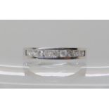 A 9ct white gold diamond eternity ring, set with estimated approx 0.50cts of brilliant cut diamonds.