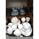 A lot comprising Tudor Bone China teawares, Gainsborough teawares decorated with white floral swags,