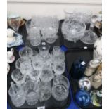 A lot comprising a selection of cut glass and crystal drinking glasses, decanters, tankards,