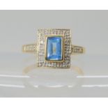 A 9ct gold blue topaz and diamond accent ring size n, weight 2.5gms Condition Report: Available upon