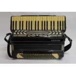 A 41 key 120 bass Hohner piano accordion in black with case Condition Report: Available upon