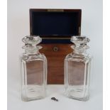 A MAPPIN AND WEBB MAHOGANY AND BRASS DECANTER BOX with a pair of glass decanters with spouts, the