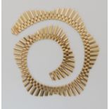 A 9CT GOLD RETRO FRINGE NECKLACE of scalloped design, made by John Grinsell & Sons of Birmingham