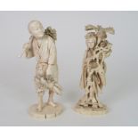 A JAPANESE IVORY OKIMONO OF KANNON standing with Ho-o bird on her shoulder and holding a Sho