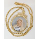 A 14CT GOLD PEARL SET PORTRAIT LOCKET with glazed panels to both sides, dimensions of the locket
