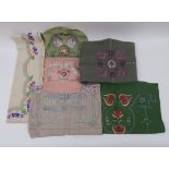 A COLLECTION OF GLASGOW SCHOOL OF ART STYLE TEXTILES including a pink rose embroidered tea cosy,