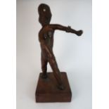 A SOUTH SEA ISLAND STYLE CARVED HARDWOOD FIGURE the standing female figure her left arm outstretched