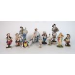 A COLLECTION OF CONTINENTAL FIGURES including a Meissen blue and white figure of a man modelled