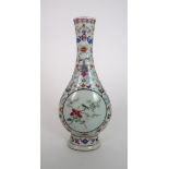 A CHINESE FLATTENED BALUSTER VASE painted with panels of birds amongst flowering branches,