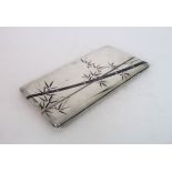 A JAPANESE STYLE STERLING SILVER CIGARETTE CASE decorated with bamboo, 195 grams approx,16 x 8cm The