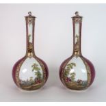 A PAIR OF CONTINENTAL BOTTLE VASES each with pink and gilt scale decoration and alternating panels