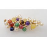 A 14K GOLD MULTI GEM BROOCH SIGNED MING'S set with globes of different gemstones to include