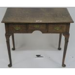 A Georgian oak lowboy with three drawers, 72cm high x 85cm wide x 48cm deep Condition Report: