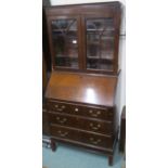 A 20th Century mahogany bureau bookcase, 166cm high x 75cm wide x 45cm deep. an oak coal depot and a