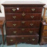 A Georgian mahogany chest with two drawers over three full width drawers over three small drawers on