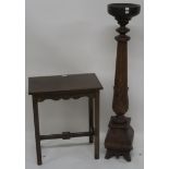 A carved wooden pedestal, 123cm high and an oak side table (2) Condition Report: Available upon