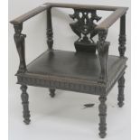 A Victorian mahogany chair with carved supports and back with a rexine seat and a piano stool (2)