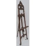 A reproduction carved easel, 180cm high x 60cm wide Condition Report: Available upon request