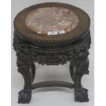 A Chinese carved hardwood stand with marble inset, 34cm high x 32cm diameter Condition Report: