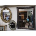 A large modern wall mirror, 122cm x 97cm and two other wall mirrors (3) Condition Report: