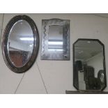 A metal framed wall mirror and an oak framed wall mirror, A wall clock and an oak mantle clock (4)