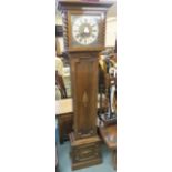 An oak longcase clock with barley twist supports with a panelled door and base, 178cm high Condition