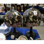 A pair of rose decorated leaded and stained glass table lamps Condition Report: Available upon