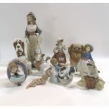 A collection of Lladro and Nao figures, mainly children and animals Condition Report: all in good