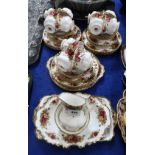 A Royal Albert Old Country Roses teaset comprising eleven cups and saucers, twelve side plates and