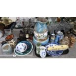 A lot comprising a Crown Devon blue glazed pitcher, a Handarbeit stoneware salt glazed decanter,