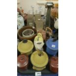 A lot comprising glazed studio pottery storage jars by Dianne Cross, a terracotta model of a