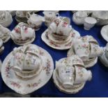 A Royal Albert Moss Rose teaset together with a Queen Anne flower decorated teaset Condition Report: