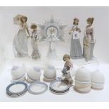 A group of Lladro figures including an Angel with star surround, four girls, a child with teddy,