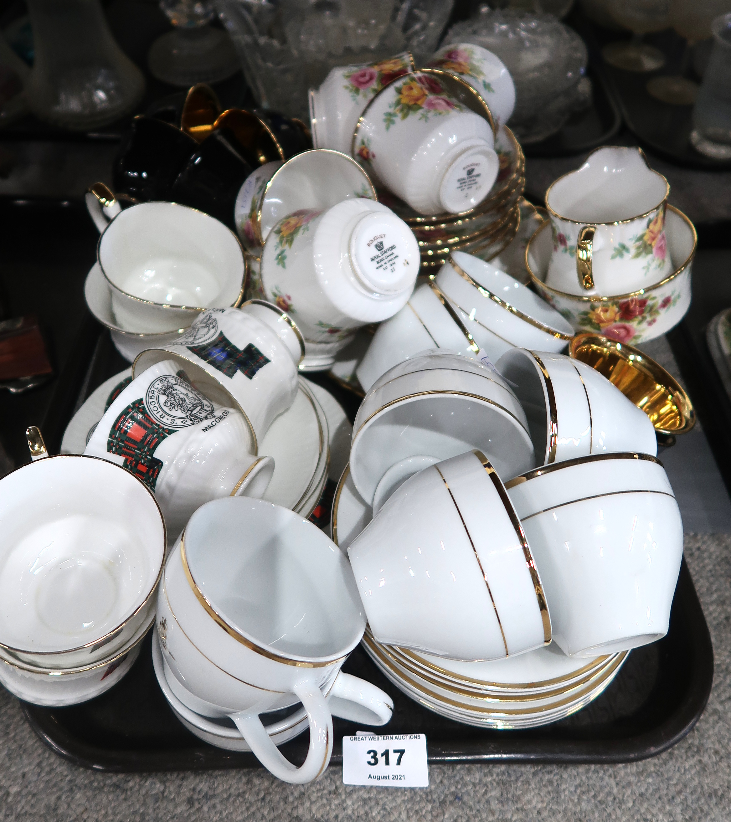 A lot comprising a Royal Stafford 'Bouquet' pattern part tea service, a Queen's Golden Jubilee