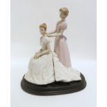 A porcelain figure of a bride and bridesmaid Condition Report: Available upon request