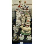 A lot comprising a selection of Staffordshire spill vases & figures, a pair of stoneware figures