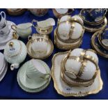 A Plant Tuscan cream and gilt teaset and a green glazed Foley bachelor set Condition Report: