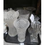 A lot comprising a quantity of cut glass & crystal, including press moulded vases, tazzas,