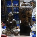 A bronzed metal Buddha and a pottery Buddha head Condition Report: Available upon request