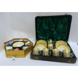 A boxed set of Royal Collection Faberge coffee cups and saucers in box and a boxed set of